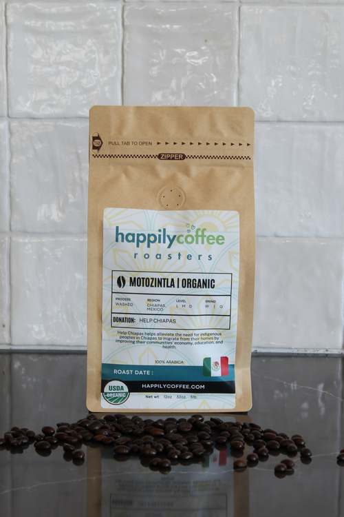 Happily Coffee Roasters coffee bag with beans on a tiled surface