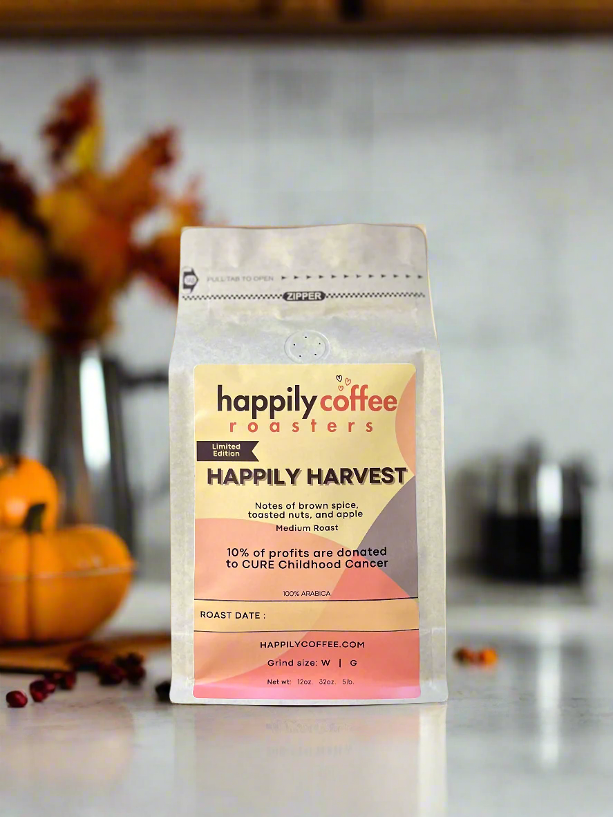 Fall blend coffee bag from happily coffee roasters on a kitchen counter.