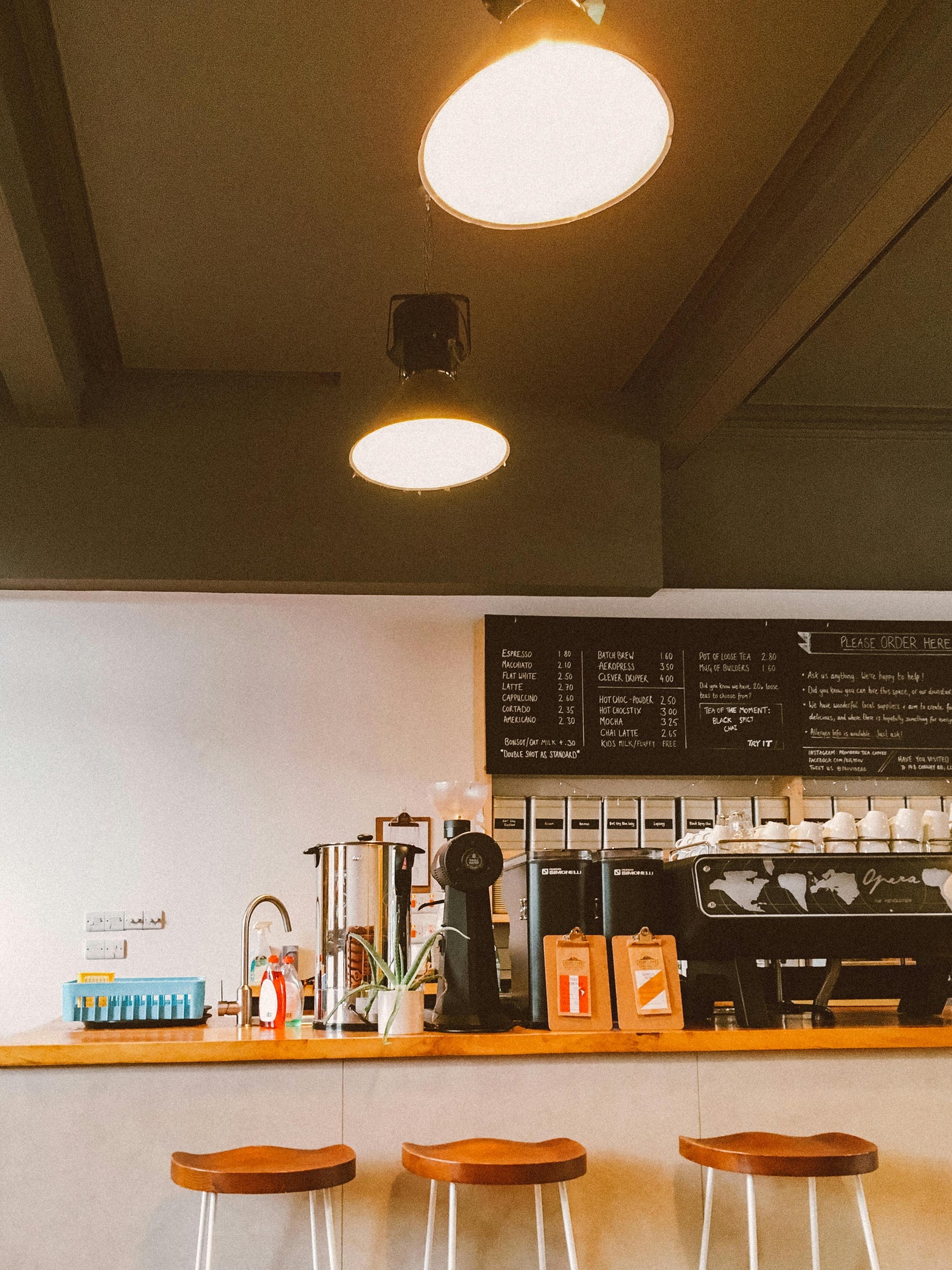 Image of a cafe with brown bar stool and brown countertop